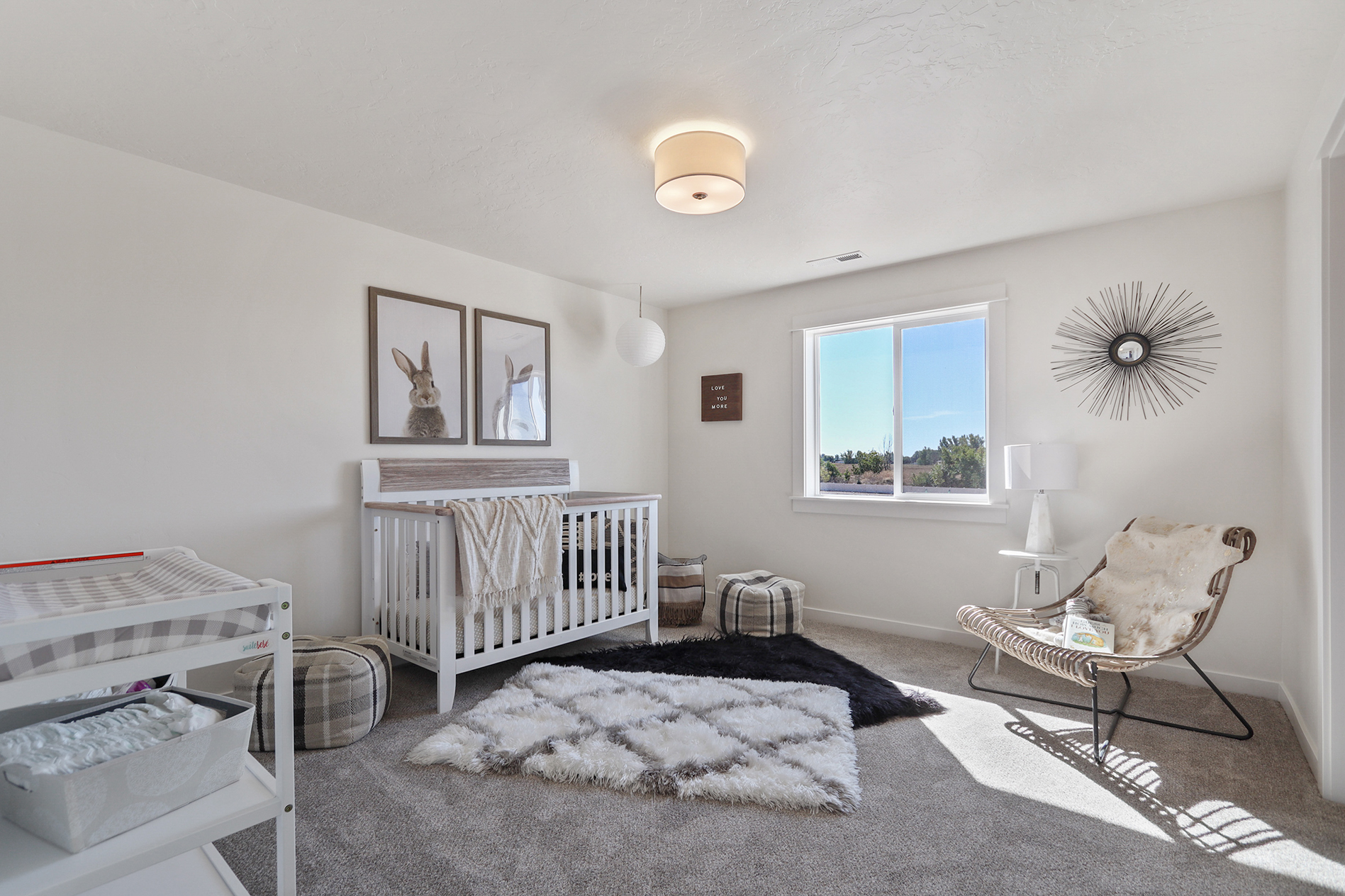 Nursery bedroom in Waterbrook model home by Hayden Homes. Designing a Kid’s Room that Lasts